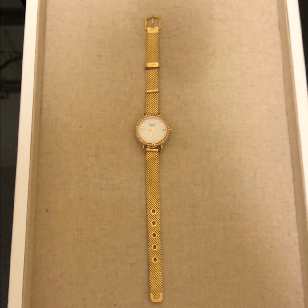 Gold KEEP collective watch face and band